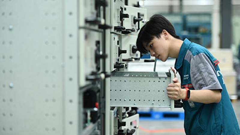 Woman working at a factory